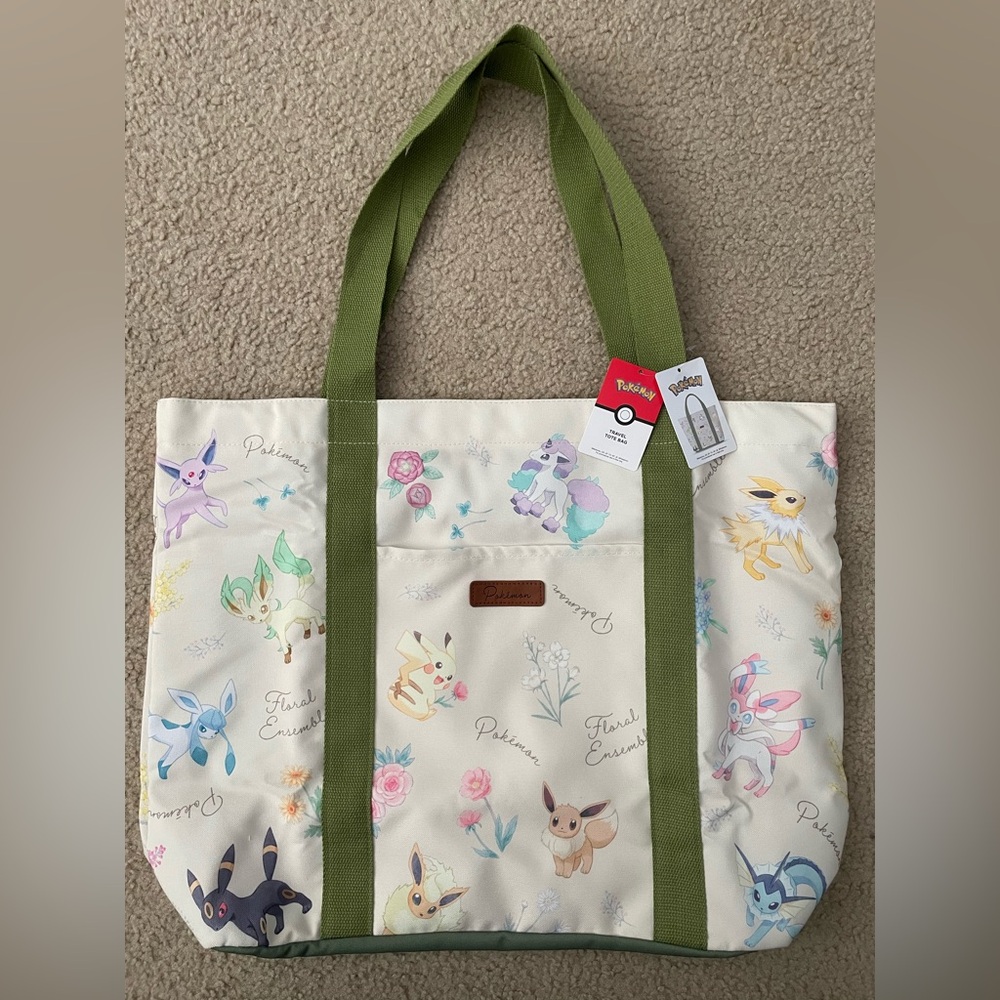 Limited Edition Pokemon Tote Bag with Green Straps and Colorful Characters